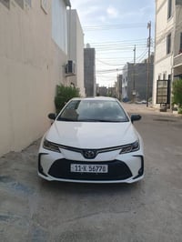 كورلا هايبرت ماشية 1000  كيلومتر موديل 2025 مرقمه كاملة سياره جديده بم...