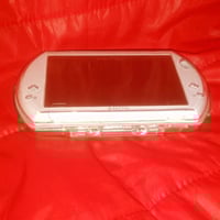 جهاز العاب محمول (PSP GO) SONY يحتوي على الكثير من الألعاب المميزة  حا...