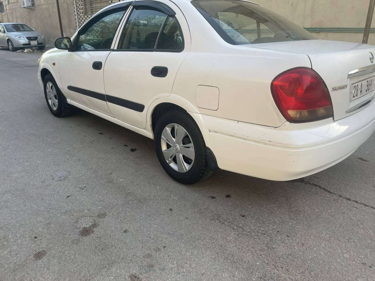 سيارة صني نيسان ياباني الاصلي ابو التفاحة مكفولة من الحادث القوي والگلبة والتچوة والگص رقم مميز نجف باأسمي مصفرة من الغرامات  المداور بنفس اليوم  تخم تايرات تبريد ثلج حدادية جديدة سيارة جاهزة فلس ماتخسر عليها   گير اوتاماتيك السعر 85 وبي مجال العنوان الديوانية قضاء الحمزة الشرقي رقم المبايل ***********
