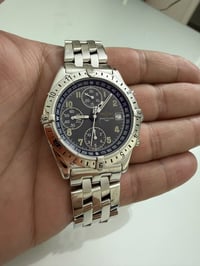 بريتلينغ • كرونومات GMT • مينا اخضر زيتي