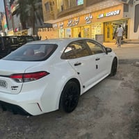 كورلا ٢٠٣٥ ماشيه ١٣ بيها هاي الطخه  رقم بغداد فول داخل مشمشي كراسي كهر...
