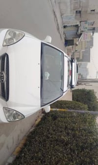 كيا كارنز  سبعه راكب للبيع 2012 رقم بغداد باسمي  هزه جديده  تحويل ثاني...