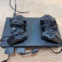 بلايستيشن 2 • ٢ جوستيك • ٧٥ لعبة