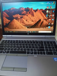 حاسبة للبيع حجم 15 نظافتها 95%  07733840454