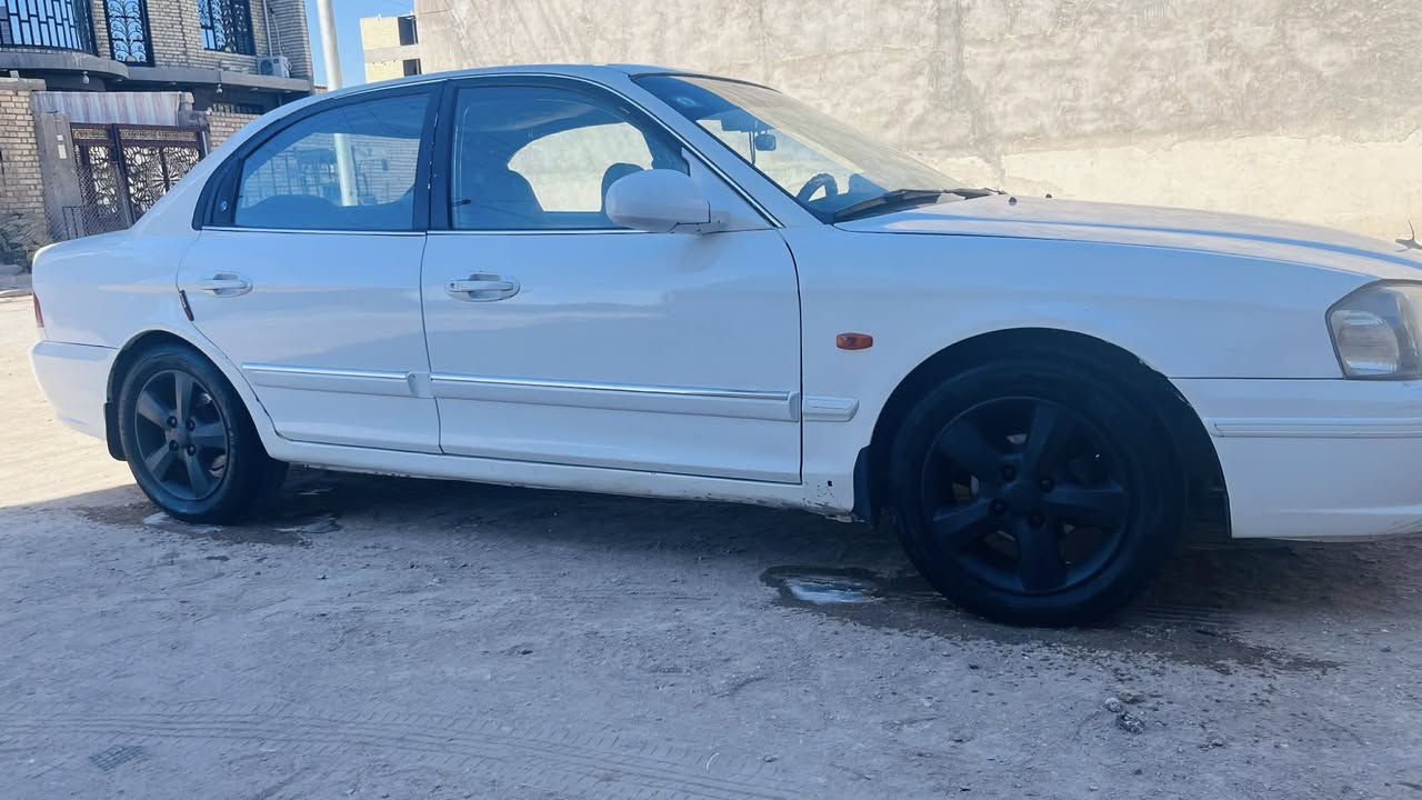 السلام عليكم 
اوبتما 2001 
كير مكينة لا تنقيص ولا تبخير
تبريد ثلج 
سنويه 29  باسمي رقم بغداد دولي 
تحويل ثاني يوم
مصبوغة عام للجمالية 
منضومه بريك جديده
راديتر جديده
باتري جديد
تخم تاير نضيف حيل 
بابل الاسكندرية 
***********
ب60 وبيها مجال
