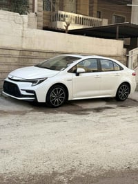 كورلا هايبرد • ٢٠٢٣ • ماشية ٢٣ الف