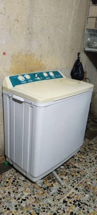 غسالة ملابس • بغداد