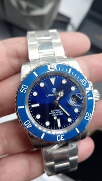 اوتوماتيك ميوتا ٢١حجر • مقاوم ١٠٠م • زجاج زفير