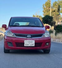 نيسان تييدا • ٢٠١١ • أصفر