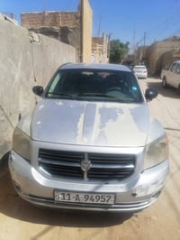 عندي سياره للبيع دوج كاليبر موديل 2007 رقم بغداد وسعرها 60 وبيها مجال ...