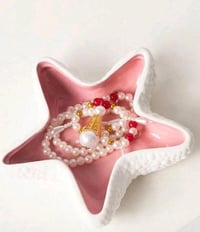 صحن نجمة البحر • حامل خواتم • ترتيب مكياج