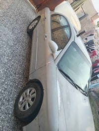 ٢٠٠٠ • تنقيص قليل • باسمي