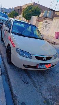 تكسي • ٢٠٠٤ • جير عادي