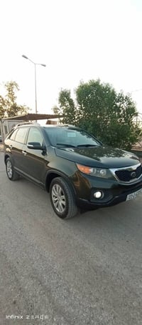 سورنتو رقم بغداد الجديد  2011فول مواصفات مكينه 6اسلندر 7راكب 3قطع تبري...