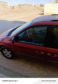 دوج كرفان 2006 محرك_6سلندر 7راكب كراسي منفصله كشنات كهربائية شاشه تحكم...