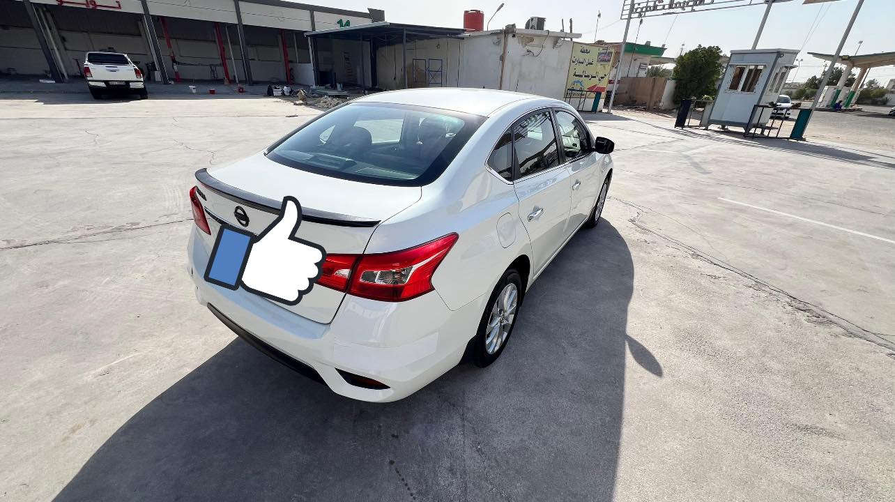 للبيع سيارة نيسان سنترا تجميع صيني بيها جاملغ امامي جهه الايمن خسفة و بقت على وضعها و الباقي كفالة
🗓️رقم اربيل دولي باسم شركة 
📅 الموديل: (2024)
🔄 ناقل الحركة: أوتوماتيك CVT
🛣 المسافة المقطوعة: (19 الف)
🎨 اللون: (ابيض صدفي / داوخل احمر جلد و الارضية مغلفه جلد)
📍 الموقع: (البصرة مركز مدينة)

✅ السيارة نظيفة جدًا
✅ تبريد و تدفئة ممتاز
✅ محرك وكير بحالة ممتازة
✅ فحص كامل وجاهزة للاستخدام
✅ لا تحتاج أي مصروف

💰 السعر: (126) — قابل للتفاوض 
📞 للتواصل: (***********/ واتساب)
