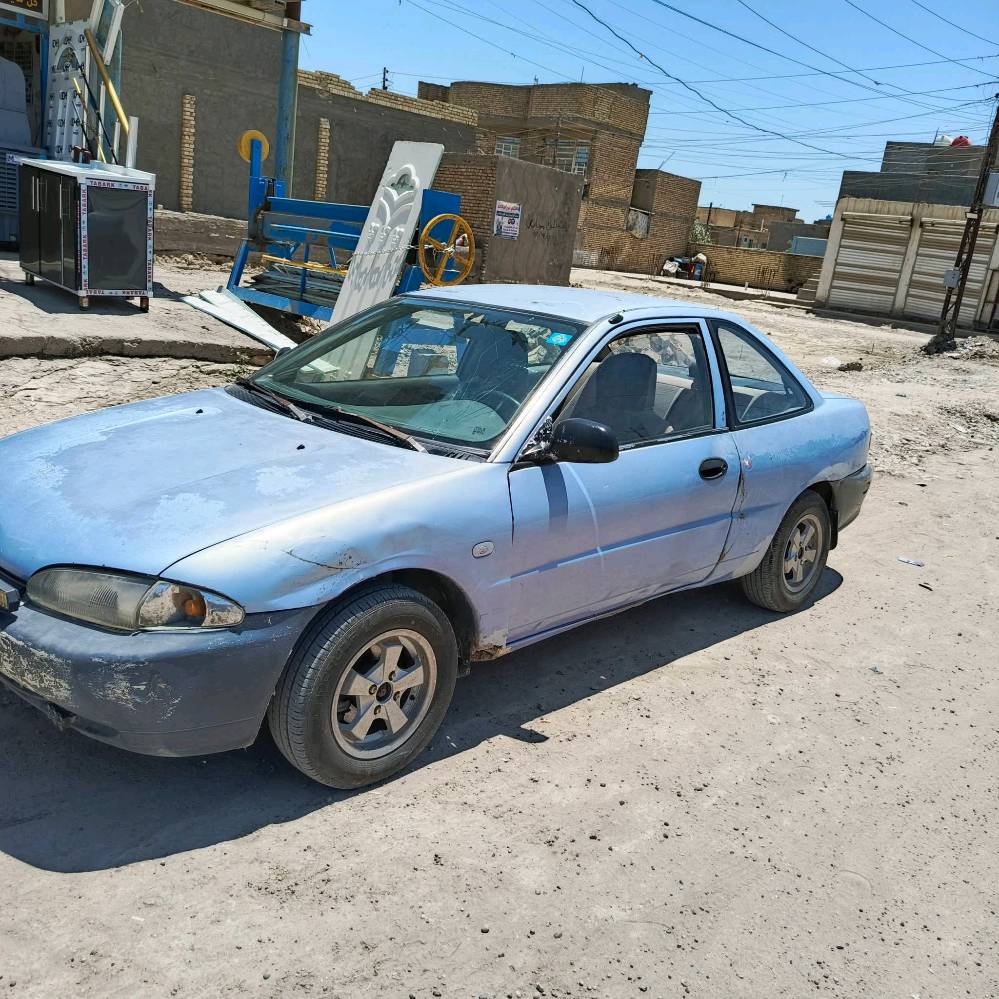سياره مسيبوبوشي ميراج 1994 تك باب كير عادي كير محرك مكفولات غرفته نضيفه الكشر شوفة عين رقمه ديالى مكاني بغداد سبع البور***********