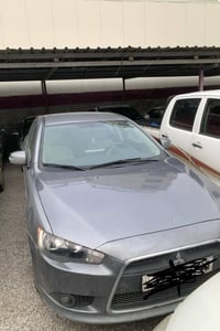 میستۆبۆشی لانسەر قرش 2015 مواسەفات خلیجی  170 هەزار ڕۆشتووە  ناو زەرد ...