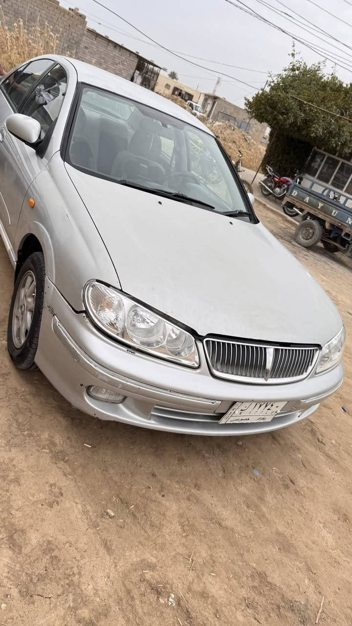 نيسان سني موديل 2000  محورة بيه قطعتين صبغ  مكاني كوت ***********
