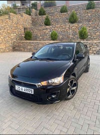 لانسر • ٢٠١٠ • أسود
