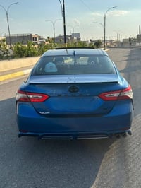 كامري موديل 2019  مواصفات SE رقم بغداد بأسمي  صبغ بنيد فقط  السياره جا...