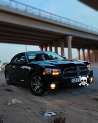 دوج جارجر البيع موديل 2012 السيارة جاهز.       من كلشي كير مكينه.كمبري...