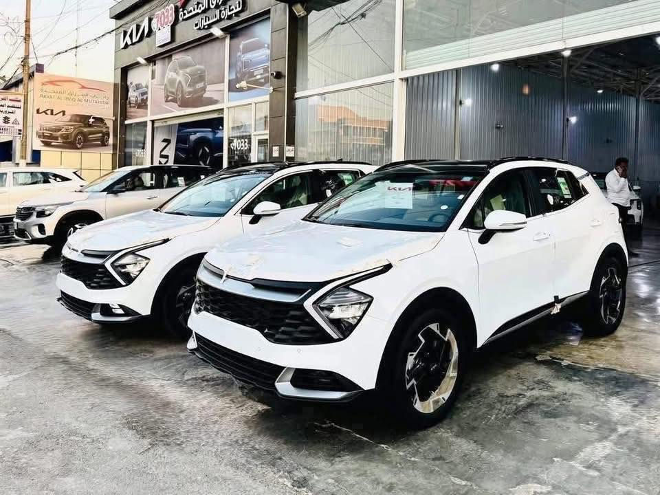 .  {.♥️مجموعه الملك لتجارة السيارات الحديثة ♥️.}

🔥🩵اقوى العروض ل كيا سبورتج 2025 فول 1/1 🔥🩵

              .✅🔥العروض نار و الاسعار نار 🔥✅

الاسعار شامل اللوحات المروريه بغداد 

🩵كيا سبورتاج 2025 زيرو  🩵‏ الي هوه نوعين 

1️⃣كيا سبورتج 2025 فول 1/1 بانوراما 

اليكم التفاصيل الآتية:👇🏻. قماره بانوراما

♥️ الموديل🔥 2025 🔥
♥️🔥قمارة بانوراما و قماره حديد الفئتين موجودات🔥 
♥️ سعة المحرك 2.0L
♥️ مرتبط بناقل حركة أوتو 6 نمر
♥️ عدد AIR BAG 2 
♥️ حساسات أمامية و خلفيه 
♥️ لايت زينون + LED ونشره لكزز لد 
♥️ كشافات  اماميه زنون 
♥️ بك لايت LED
♥️ حجم الاطار ويل كاب كروم 19  
♥️ 4 دسك
♥️ ماسحة خلفية
♥️ اريل نفكيتر 
♥️ مفتاح التشغيل بصمة و تشغيل عن بعد 
♥️ فتح الصندوق كهرباء 
♥️ شاشة Apple Car play
♥️ كاميرا دوارة
♥️ الانارة الداخلية LED
♥️ حركة المقاعد الأمامية كهرباء
♥️ تدفئة المقاعد الأمامية 
♥️ تدفئة المقود
♥️ مثبت السرعة Cruise
♥️ المودات والأوامر الصوتية
♥️ أوضاع القيادة  Drive Mode 
♥️ حساسات ضغط اطارات 
♥️ مقود جلد حياكة 
♥️ شفتات ستيرن 
♥️تبريد بيانو شاشة
♥️قطعتين تبريد 
♥️ ا ABS 
♥️سايد بريك بصمه ا Auto Hold   أوتو هولد
♥️ نظام مانع الانزلاق
♥️ نظام نزول المنحدرات 
♥️ اشارة في المرايا الجانبية رادار 🔥
♥️ مخرج منفذ الطاقة ⚡
♥️شاحن هاتف Wireless 
 💵 السعر نار 🔥🔥

الاسعار شامل اللوحات المروريه بغداد  ‼️رقم بغداد ‼️
        
العنوان⬅️بغداد ⬅️ الكريعات ⬅️نهايه شارع المعارض 

اوقات الدوام > من الساعة 10 صباحاً الى 10 ليلاً 
يتوفر عدنا بيع وشراء ومراوس 
للاستفسار  الاتصال ع الارقام التاليه 

☎️***********

☎️***********

☎️***********
