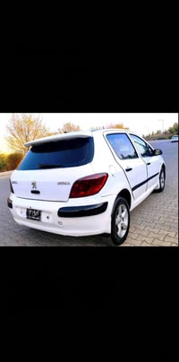 بيجو ٢٠٦ • ٢٠٠٦ • توماتيك