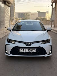 كـورلا 2023 خليجي بصمة تشغيل + أبواب  فتحة سقف  كشنات جلد احمر محرك 18...