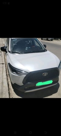 تويوتا كورلا كروس 2025 هايبرد HEV ماشية 28 الف كيلو رقم بغداد جديد وال...