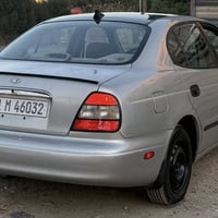 لكنزا موديل 2001 كير اوتو كير مكينه مكفولات  تخم تاير جديد السياره بلا...