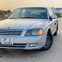 اوبتيما • ٢٠٠٢ • بابل الشوملي
