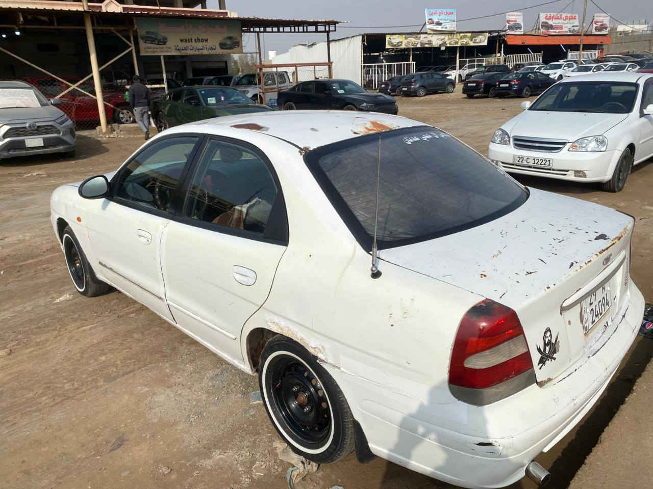 يا الله للبيع دايو نوبرة موديل 2001رقم واسط انكليزي سنوية ل31 بسمنة كير ومحرك حاوية  تخم تاير جديد قبل ٢٠يوم شادهن سيارة كاملة وكشرها كدامك واضح سعر 33ورقة وبيهة مجال عنوان واسط صويرة ‏‪***********‬‏
