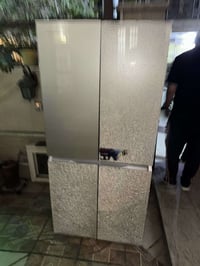 ثلاجه اربع بيبان نوع جنرال شغاله وما بيها شي بس البيبان الخارجيه من خا...