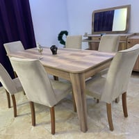 طاولة ٦ كراسي • خشب جوزي • بحالة الجديد