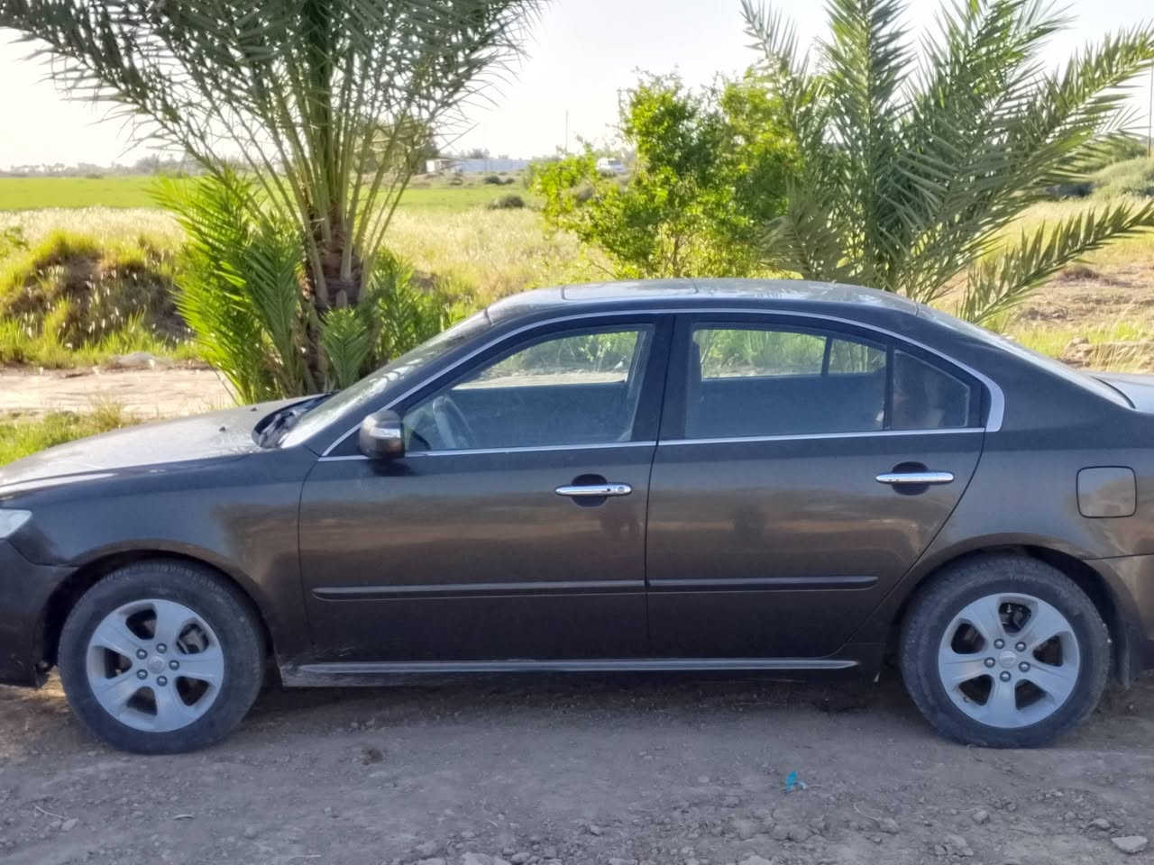 اوبتيما موديل 2010 خليجي رقم بغداد بأسمي السعر 120 بيه مجال 
مواصفات 
بصمه 
فتحه 
اشاير مري شفط 
كير شركه 
حداديه جديده تايرات جدد 
اضرار جاملغ خلفي (هلال فقط) 
مكينه مفتوحه  
العنوان بابل  القاسم  ***********للاستفسار
