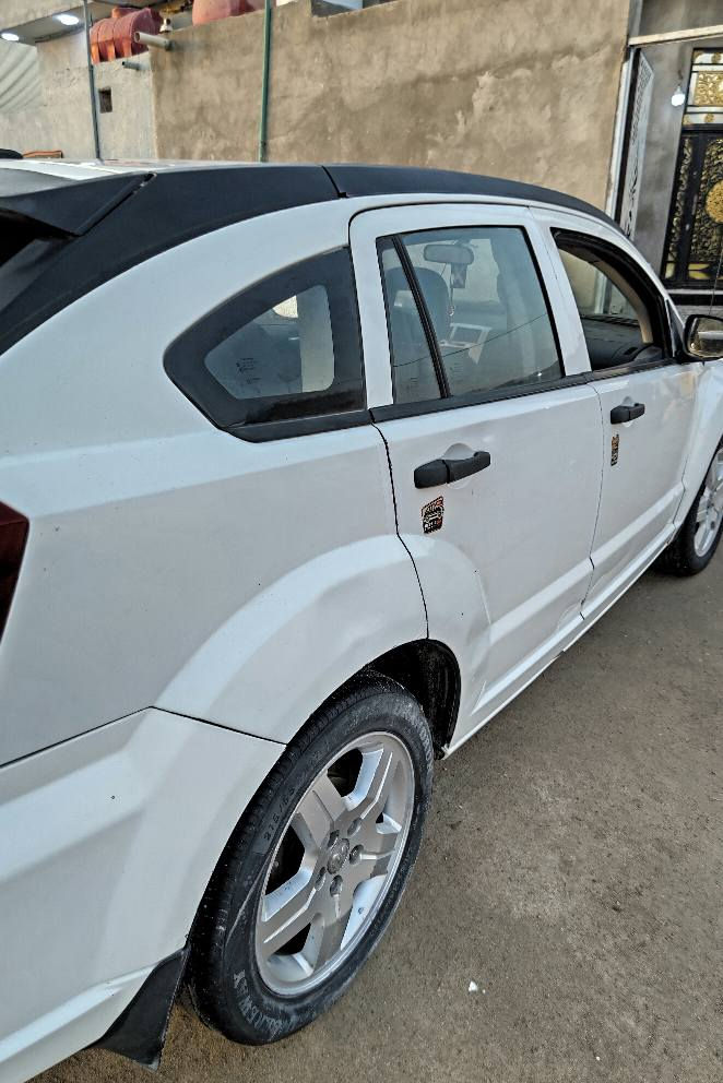 دوج كاليبر 2008 رقم بغداد مشروع وطني السياره بيهه كازكيد بس تمشي مكان السياره البصرة شط العرب رقم *********** واساب شط العرب, البصرة
