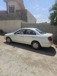 نیسان سەنی 2009 گێر عادی سەدەفی بێ بۆیاغ  تەنها 3تەعدیل ژمارە 07706100...