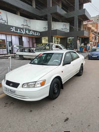 من رخصة الادمن كامري للبيع موديل 2001 رقم اربيل انكليزي مصبوغة حزام ال...