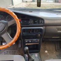 سياره مازدا للبيع  موديل 1989 وبيها صبغ فقط من جهت السايق  باب و دائر ...