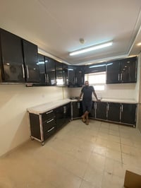 معمل الاخوين لكافه تصميم الكاونترات الحديثه الامنيوم وال hdf  وبنسب ال...