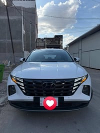 توكسان موديل 2023  ابيض اللون ماشية 33 الف المواصفات بصمة ثلاث أنظمة ق...