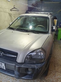 توسان 2009للبيع  محرك2000دوش   07712944126