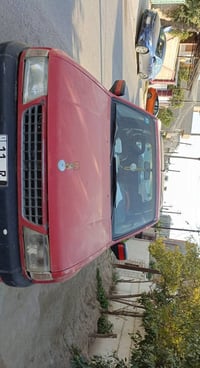 دفع رباعي • جير عادي • محرك ٢٠٠٠