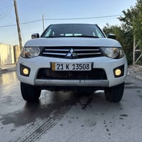 ميتسوبيشي 4X4 L200 موديل ٢٠١٣ كاز (ديزل) ماشية ١٨٣ كم  السيارة نظيفة ج...