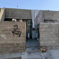 دار ١٠٠م • ارض ٤٠٠م • قرب جامع العدل