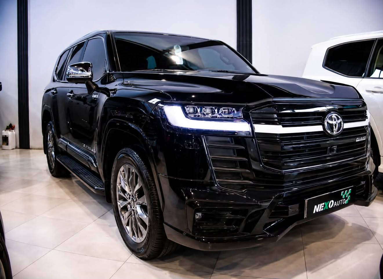 Toyota Land Cruiser Black Edition GXR
مۆدێل ٢٠٢٤

* واردی خەلیج
* ماوەی ڕۆیشتن: ١٠,٠٠٠ کم
* Clean Title، بێ بۆیاغ
* کامل PPF کراوە (پاراستنی تەواوی بۆدی)
* Black Edition
* ٣ شاشە (شاشەی سەرەکی + دوو شاشەی دواوە)
* کوشنی چەرمی سور و ڕەش
* سیستەمی 4WD
* شاشەی تاچی گەورە
* کامێرای 360°
* سنسووری پێش و دوا
* کروز کۆنترۆڵ
* دەرگای Smart Entry و Start/Stop
* شاشەی پانۆراما

نرخ: 83,500 $

ژمارەی مۆبایل:
+964 750 391 7575

⸻

بالعربية

Toyota Land Cruiser Black Edition GXR
موديل 2024

* وارد الخليج
* الممشى: 10,000 كم
* Clean Title بدون صبغ
* حماية PPF كاملة للهيكل
* فئة Black Edition
* 3 شاشات (الشاشة الرئيسية + شاشتان خلفيتان)
* مقاعد جلد أحمر وأسود
* نظام دفع رباعي 4WD
* شاشة لمس كبيرة
* كاميرا 360°
* حساسات أمامية وخلفية
* مثبت سرعة
* دخول ذكي وتشغيل بالبصمة
* فتحة سقف بانورامية

السعر: 83,500 دولار

للاستفسار:

+964 750 391 7575

Location/ 
BALEN CARS
https://maps.app.goo.gl/prz5bVL7eHQKwQHu9?g_st=ic

NEXO AUTO
Buy • Sell • Advertise
Premium Car Marketplace

#toyota #landcruiser #LuxuryCars #Erbil #japan #sulaimanyah #iraq #baghdad #basrah #najaf #karbala #karkuk #duhok #zakho #kurdistan #dubai


**إذا كنت صاحب هذا الإعلان وتريد حذفه لأي سبب، رجاءا أرسل رسالة إلى الدعم الفني**