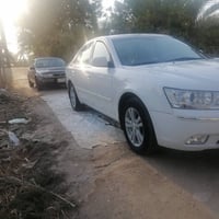 سوناتا موديل 2010 لون ابيض وارد كوري حلوة جدا. تبديل ٣ قطع. جاملغ أيسر...