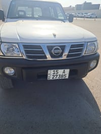 وبركاتة نيسان باترول موديل 2002 كير محرك جاهز كير عادي رقم انبار انكلي...