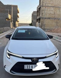 للبيع كورلا هايبرد خليجي رقم بغداد موديل 2025 بعده زيرو ماشية 2200 كم ...